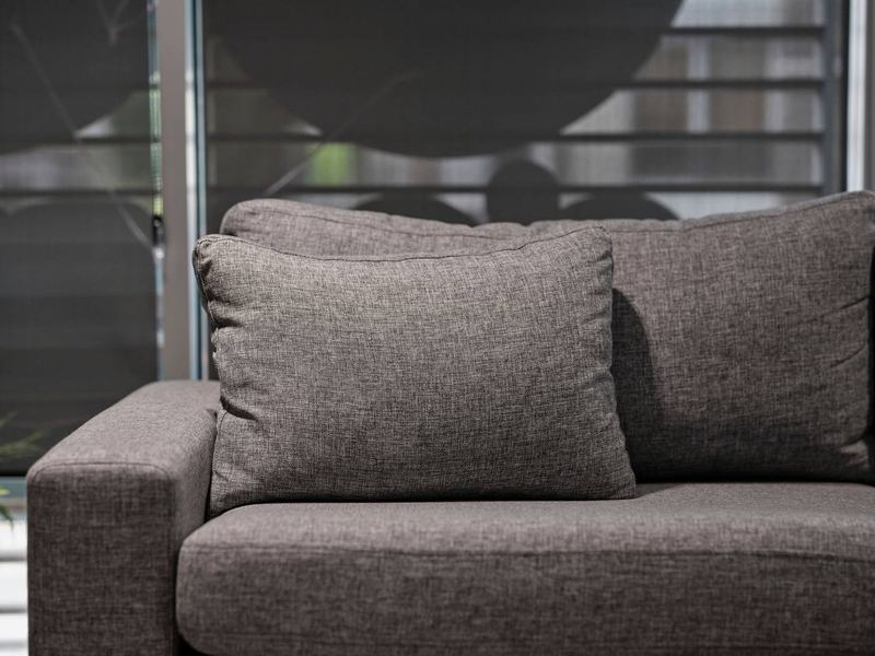 Clean grey sofa in a living room